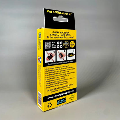 Yellow and black Kibosh packaging on a grey background